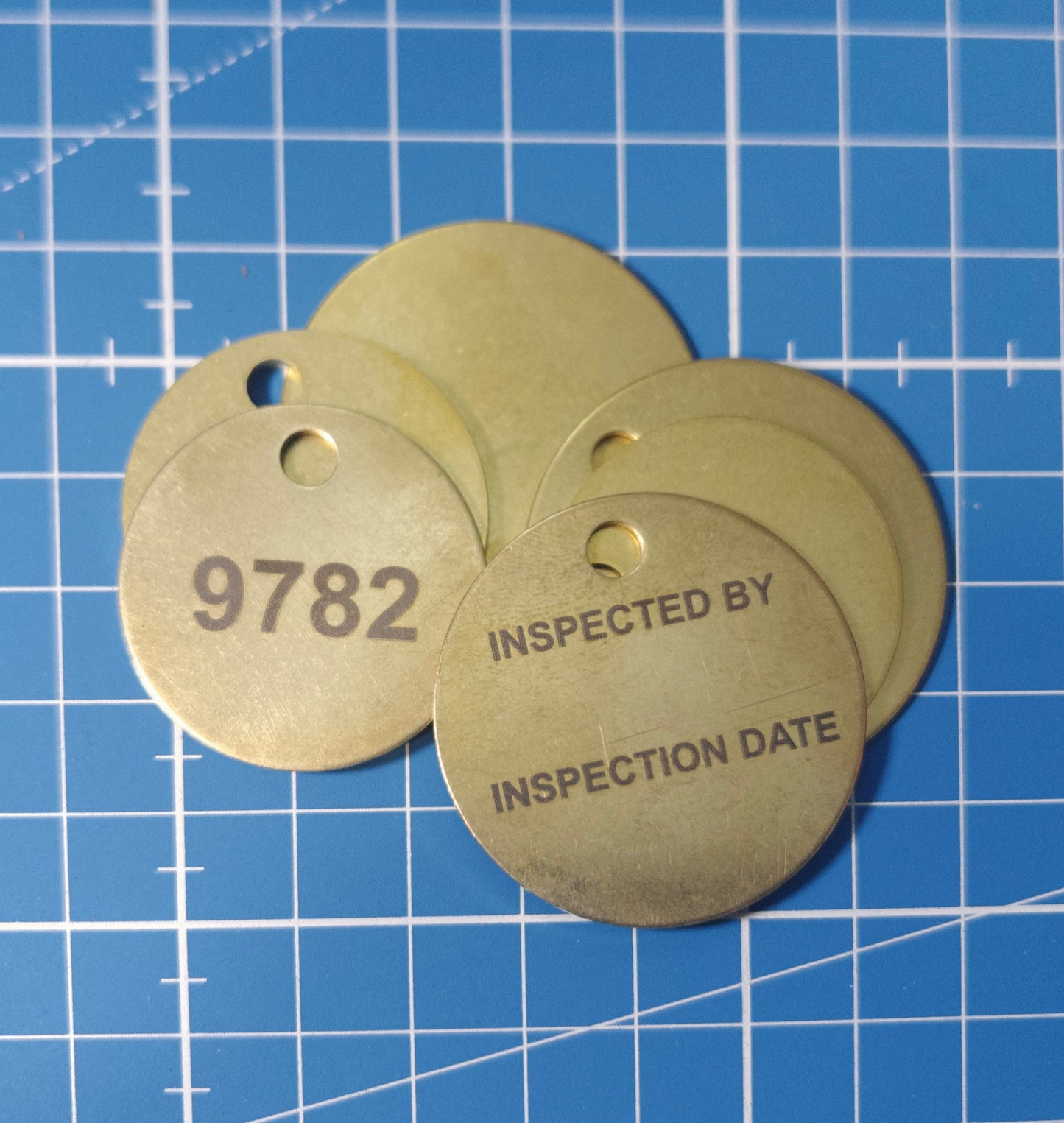 Custom engraved brass tags